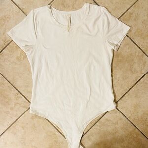 Babaton Cream Short Sleeve Bodysuit Aritzia